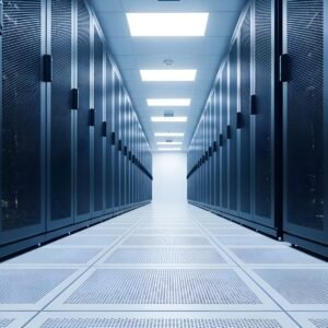 Rows of server racks along a brightly lit data centre corridor